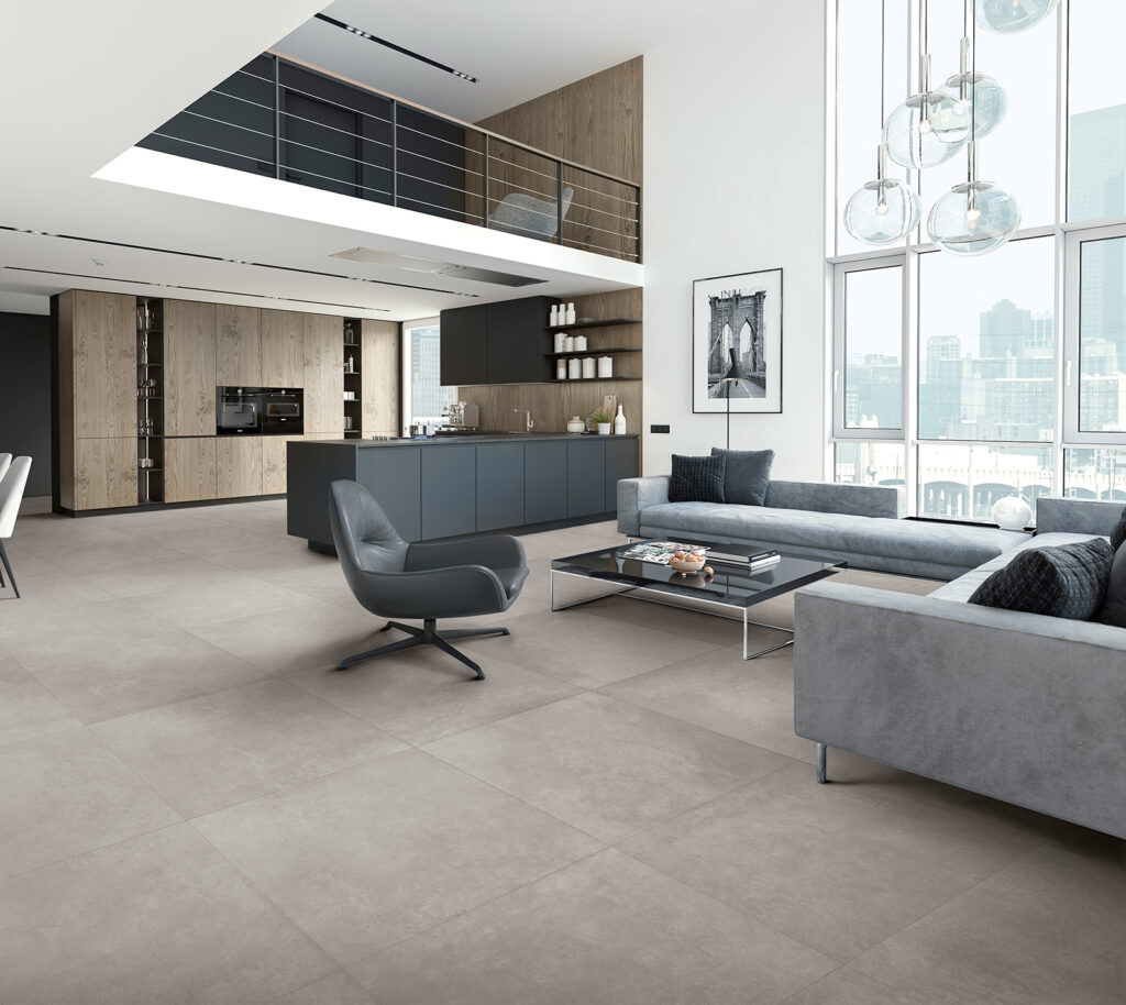 jardin privé avec pose de carreaux en grès effet ciment sur gazon