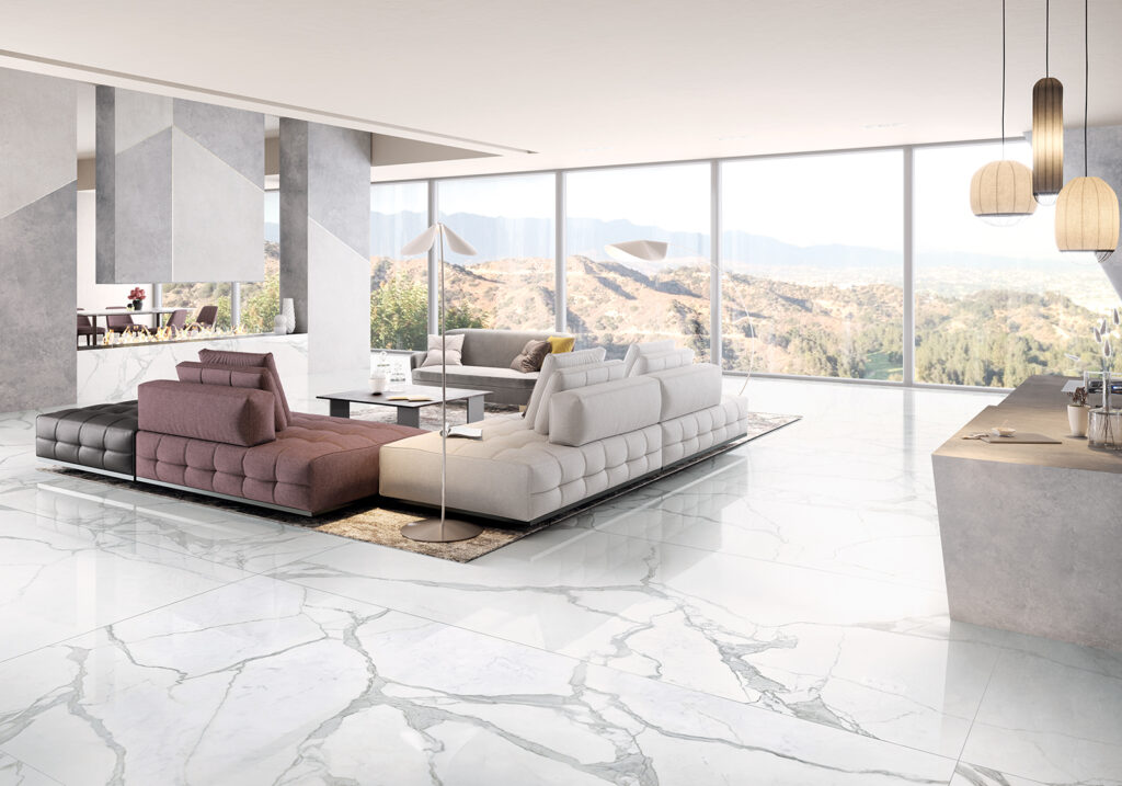 Espace de vie et cuisine ouverte avec un revêtement de sol en grès cérame effet marbre