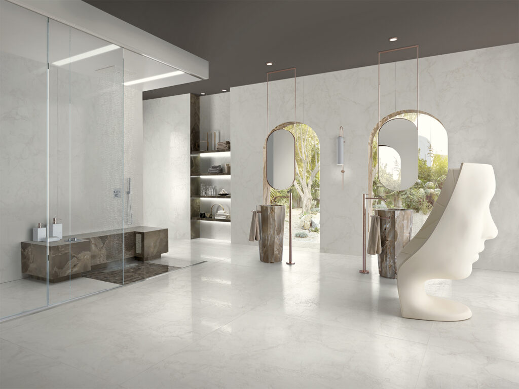 Bathroom with shower and double vanity, featuring white marble-effect porcelain stoneware