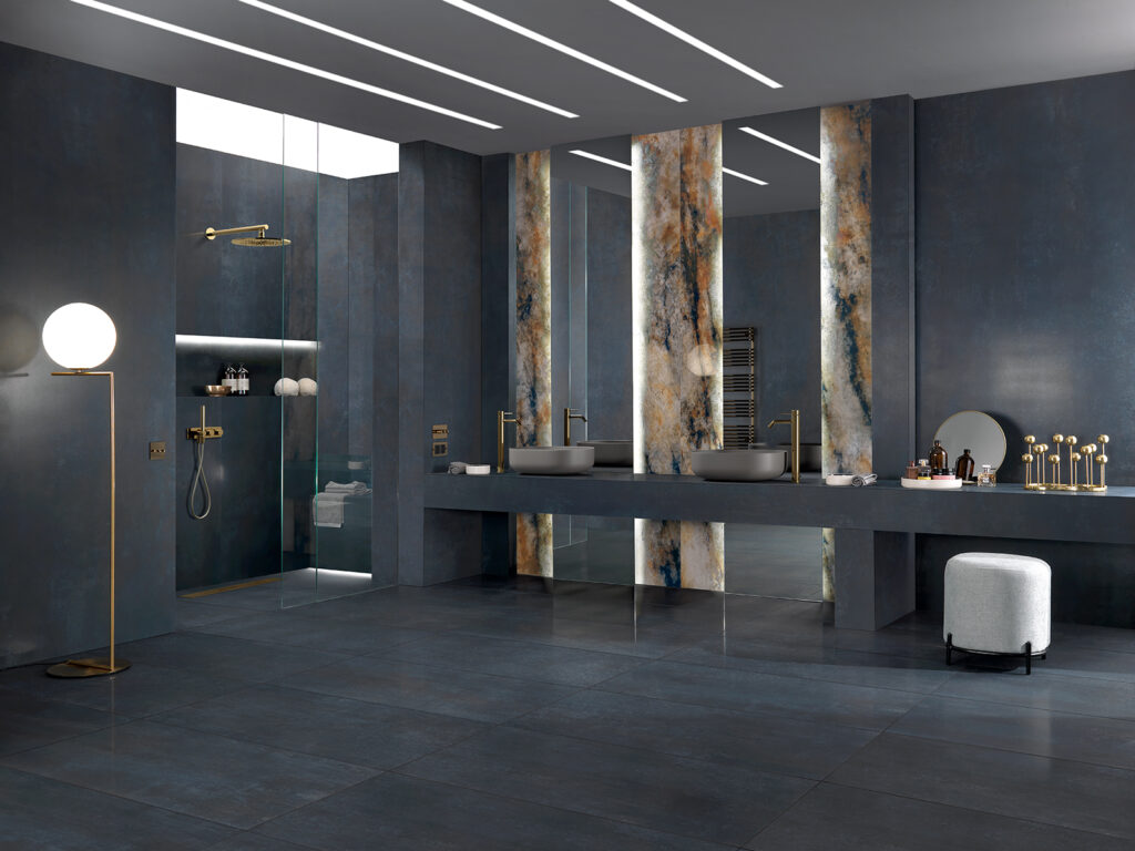 Bathroom with double washbasin and shower, in blue metal-effect porcelain stoneware
