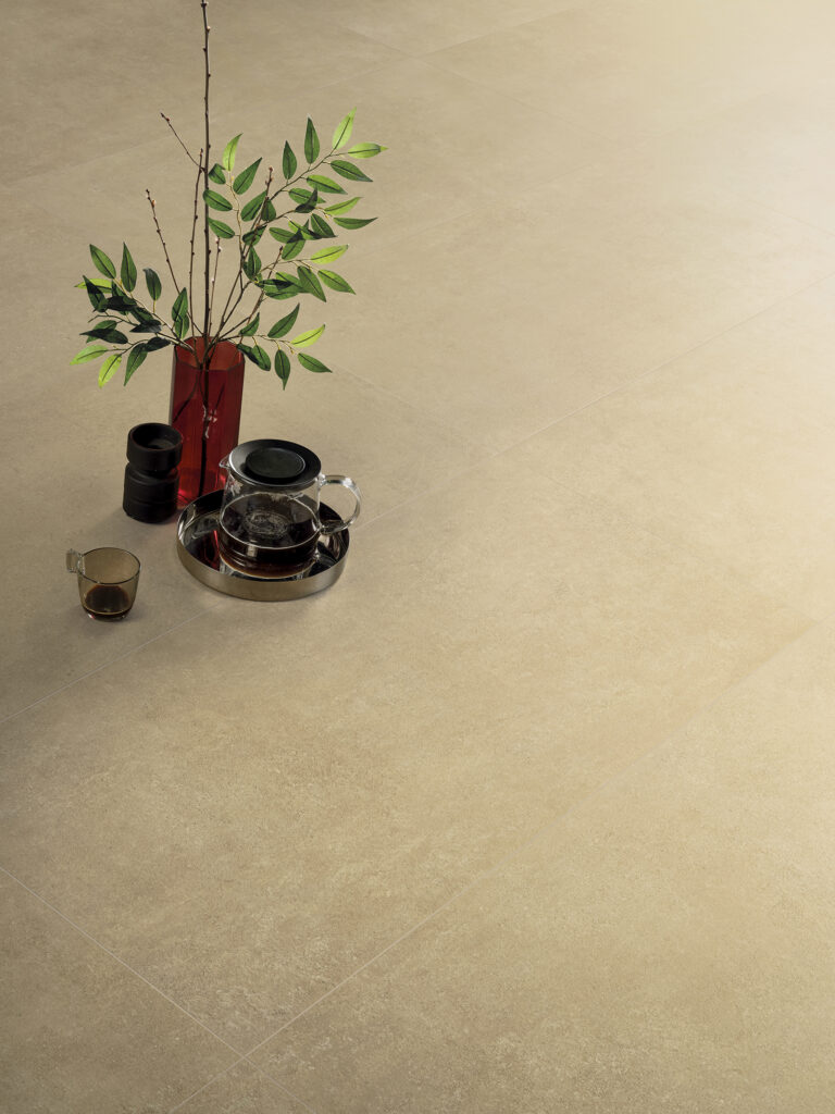 dettaglio struttura piastrella in gres effetto cemento color giallo senape