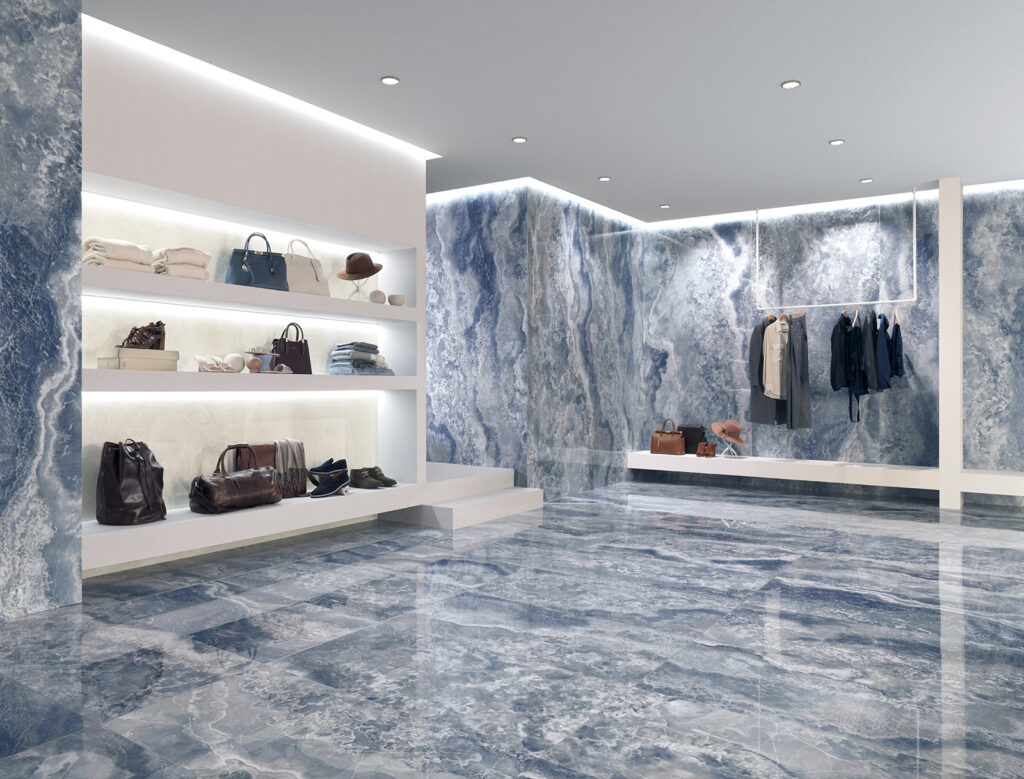 negozio di abbigliamento e accessori, rivestito in gres effetto onice azzurro