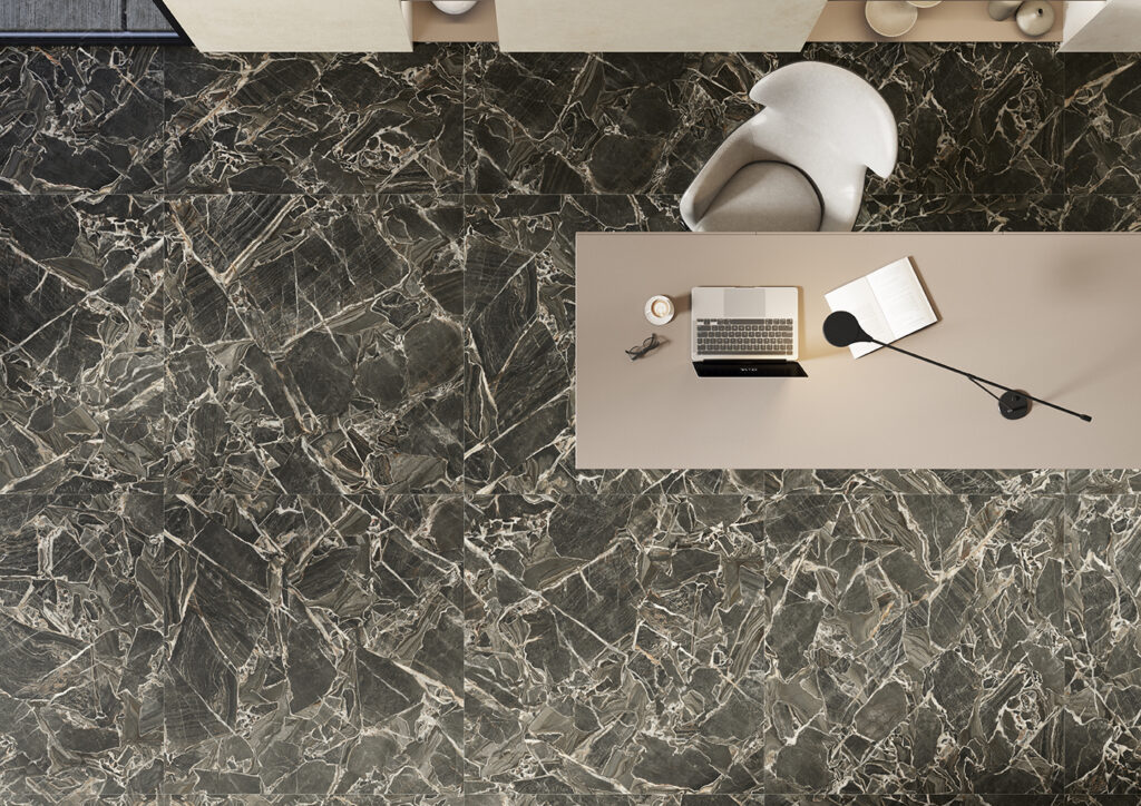 Black marble-effect porcelain floor with light veins and crystals, office desk