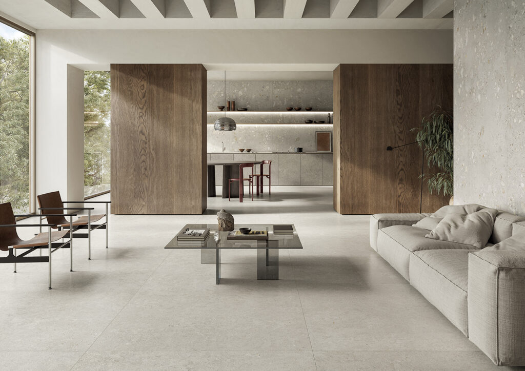 open space in gres porcellanato con cucina a vista