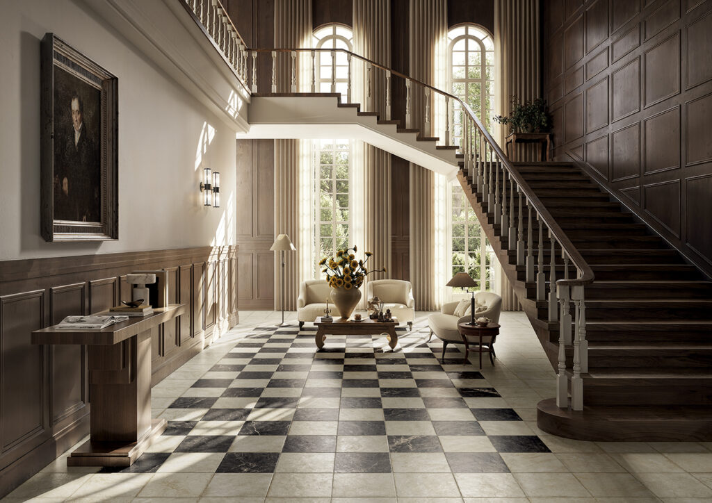 ingresso living con pavimento a scacchiera dal colore beige e nero effetto marmo